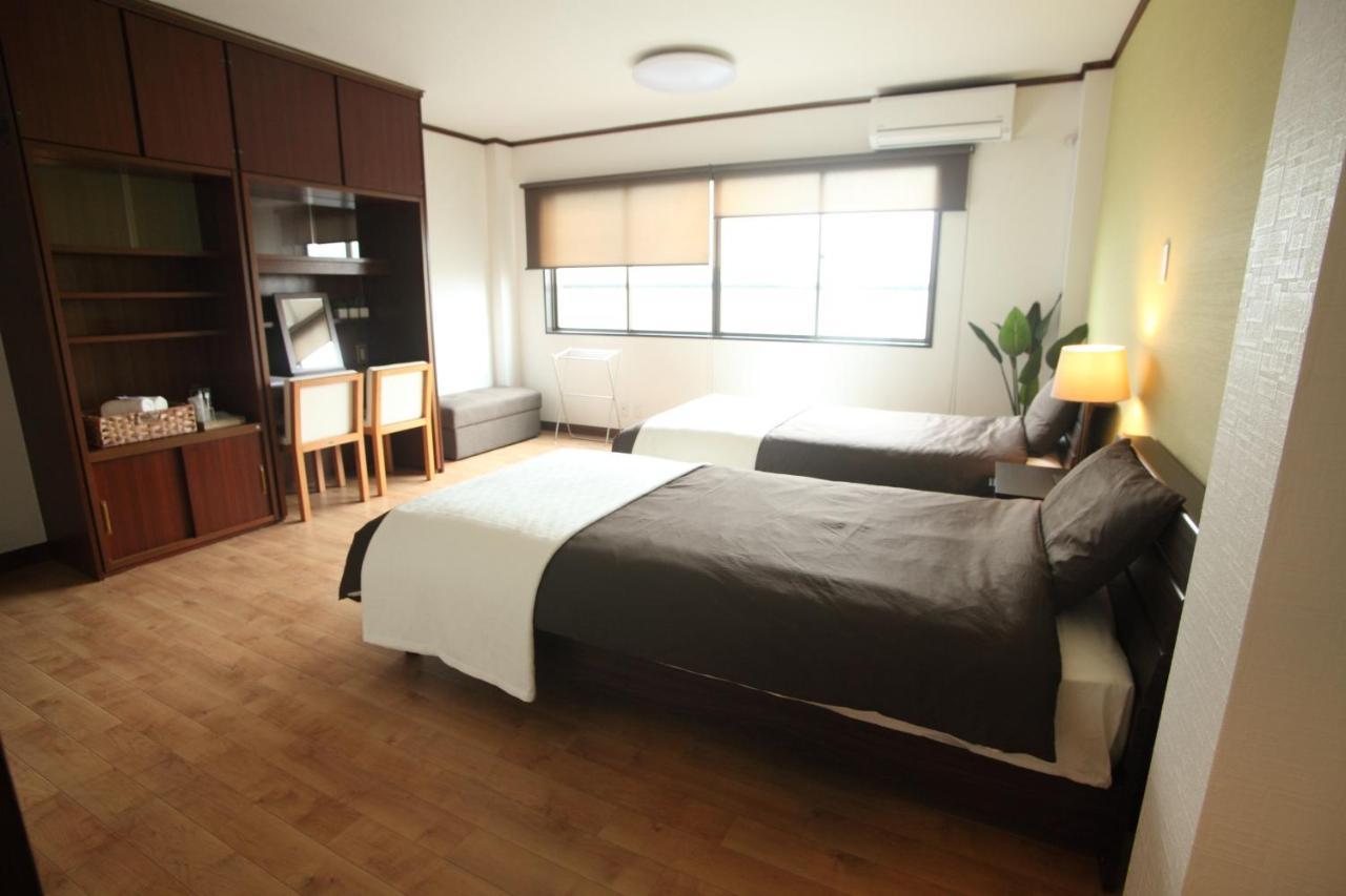Guest house FUTABA Ōsaka Extérieur photo
