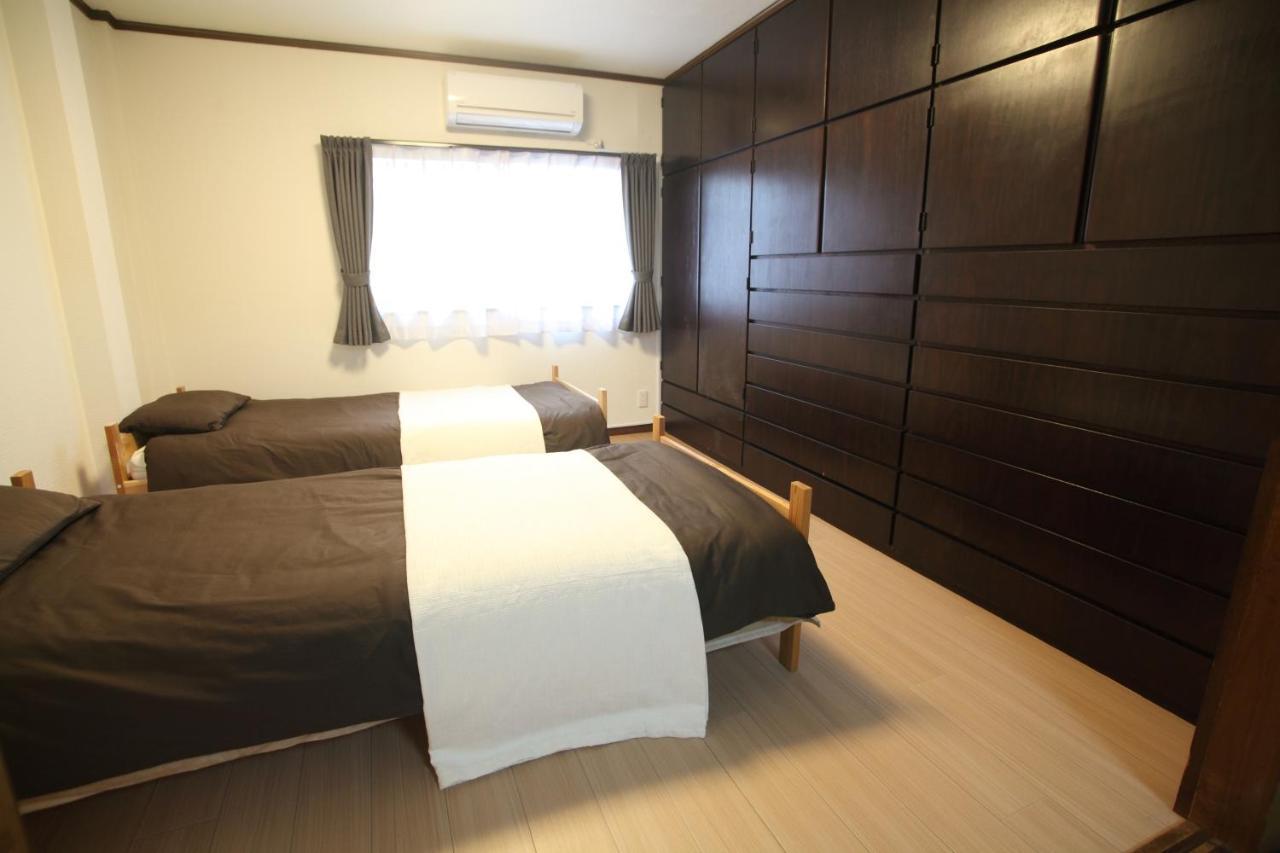 Guest house FUTABA Ōsaka Extérieur photo